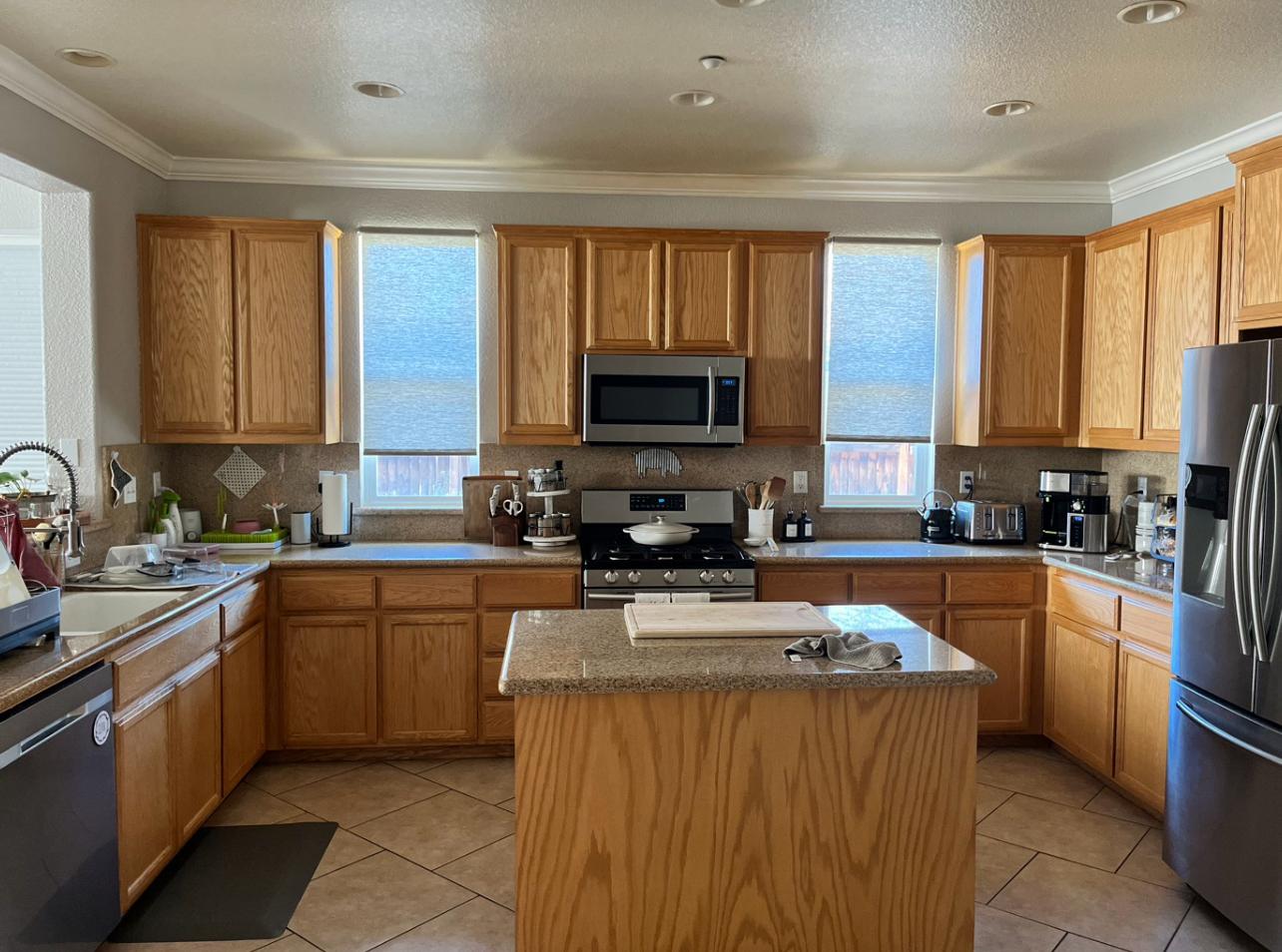 Same kitchen with cabinets refinished in white Sayerlack
